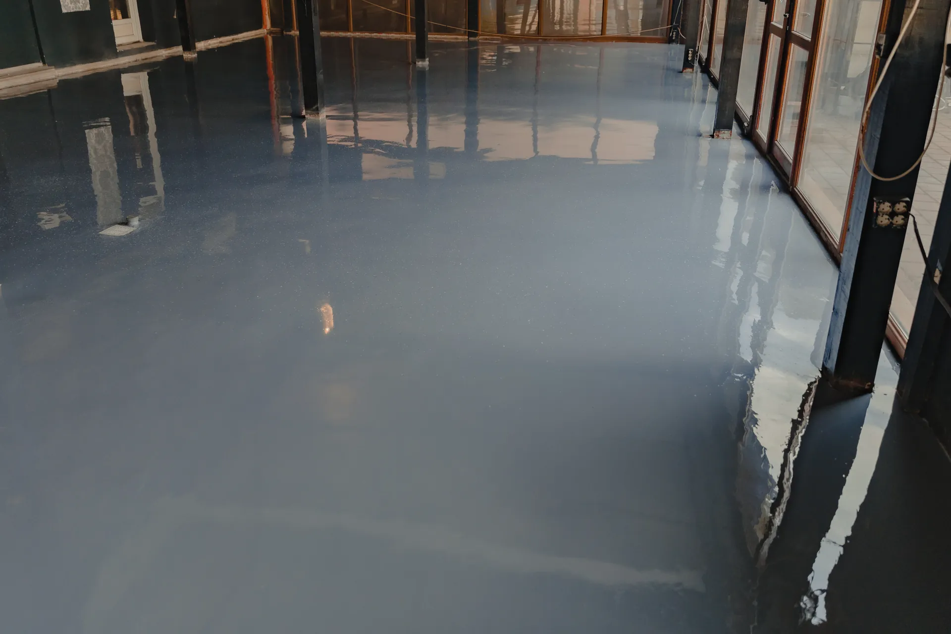 High-gloss coated floor (illustrative)