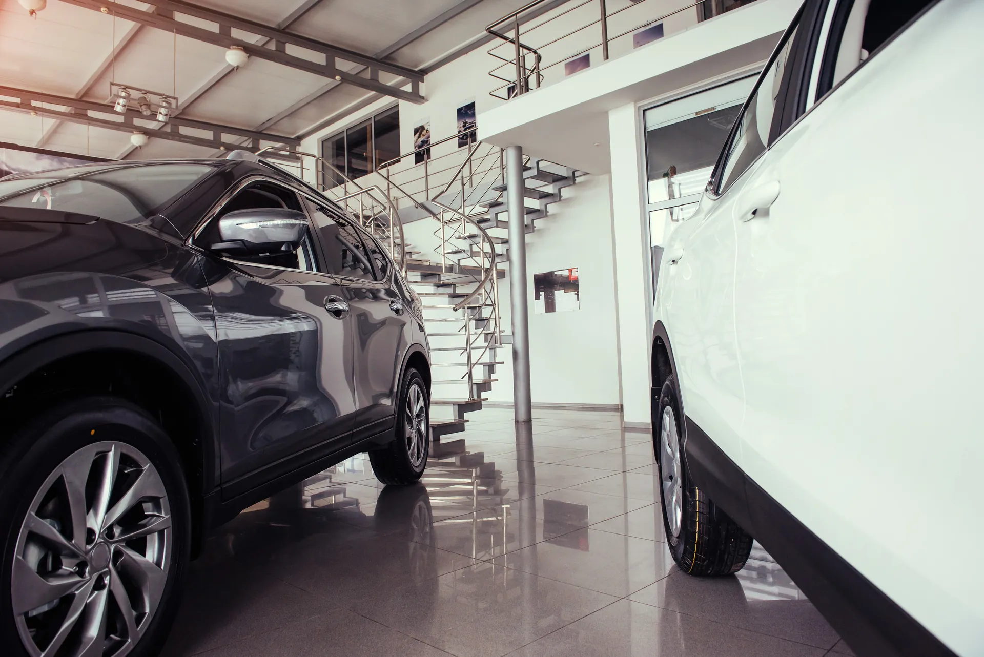 Car on a high-gloss epoxy showroom floor